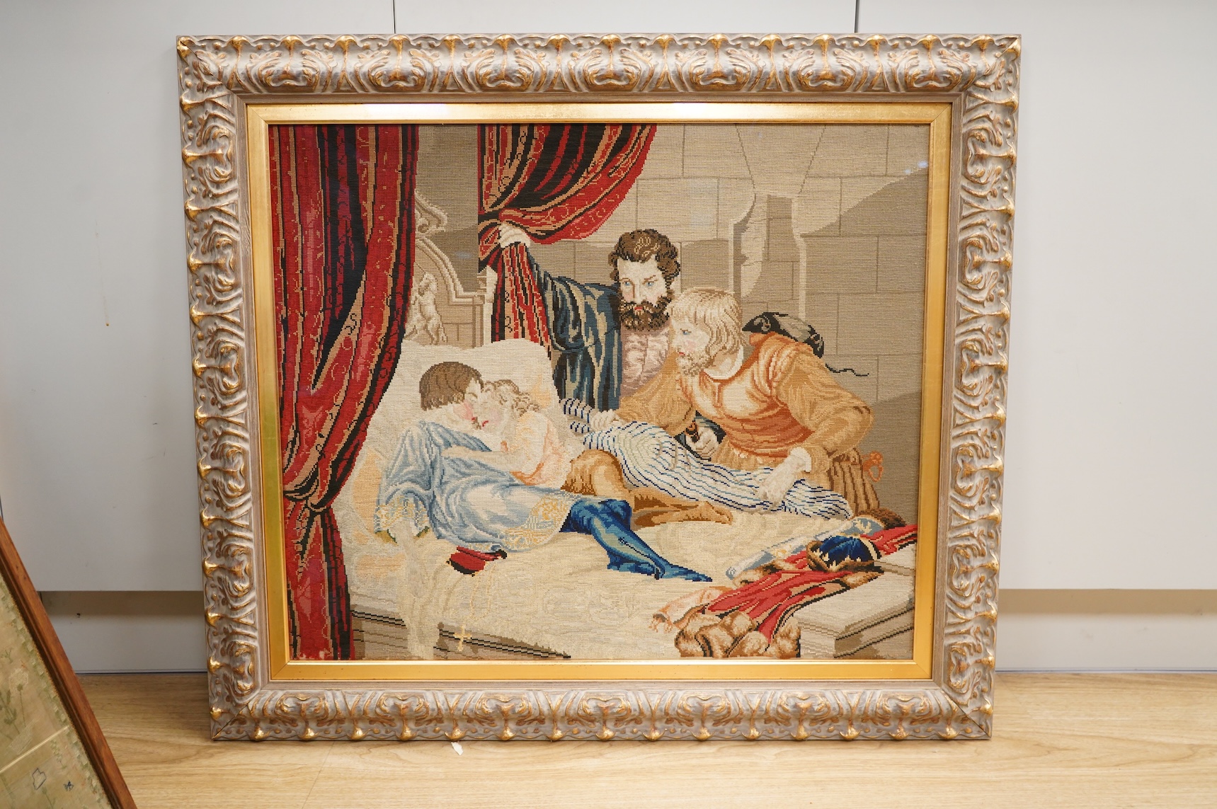 A 19th century Berlin wool work panel of the two princes in the tower - 60cm x 71cm and another wool work with petit point detail of the three graces, both framed.